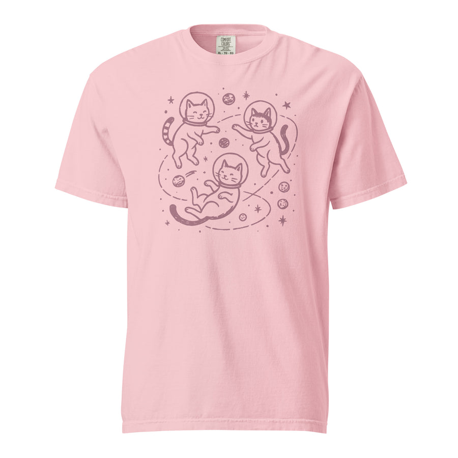 Space cat heavyweight tee — pink line-art kittens tumbling between planets, stars. Unisex graphic t-shirt, a great cat-lover gift.
