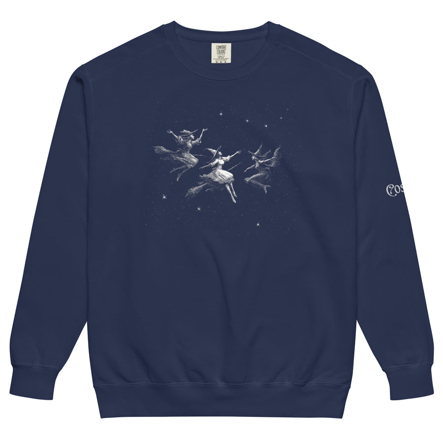 Witchy garment-dyed sweatshirt — slender white witches mid-dance, scattered through. Unisex graphic sweatshirt, a great witchy gift.