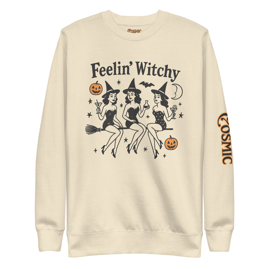 Witchy Halloween sweatshirt — 'Feelin' Witchy' script above three witches on brooms. Unisex graphic sweatshirt, a great witchy gift.