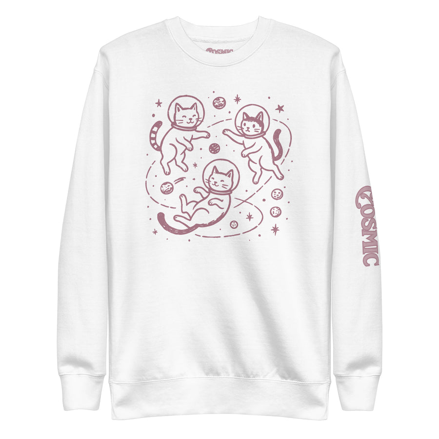 Space cat sweatshirt — pink line-art kittens tumbling between planets, stars. Unisex graphic sweatshirt, a great cat-lover gift.