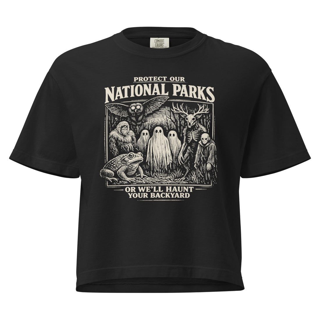 Black women's boxy Protect Our National Parks tee with a cream woodcut cryptid coalition graphic